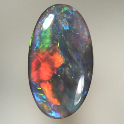 SOLID BLACK OPAL Bright reds over blues